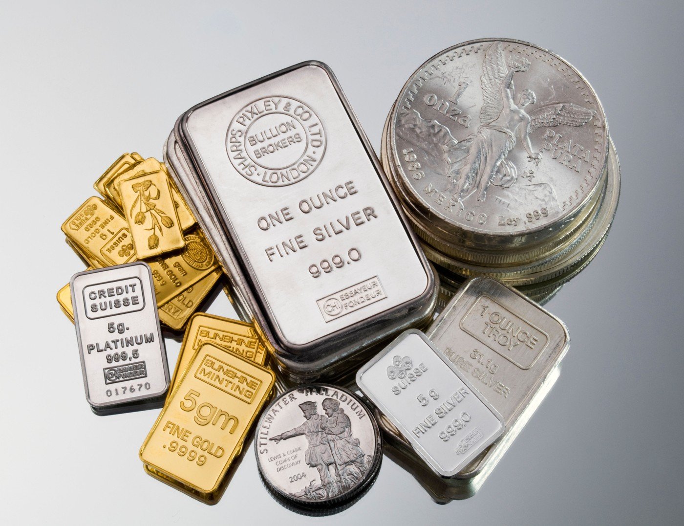 Aurul și argintul, în cădere bruscă pe piețele globale