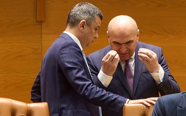 Bolojan, „diriginta” Isoscel: Ce se ascunde în spatele deciziei?